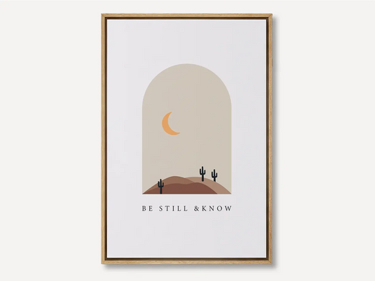 Find calm and faith in modern style with this inspiring Christian canvas wall art. This framed canvas print features a peaceful, minimalist desert landscape and the powerful, comforting command from Psalm 46:10 to Be Still & Know.