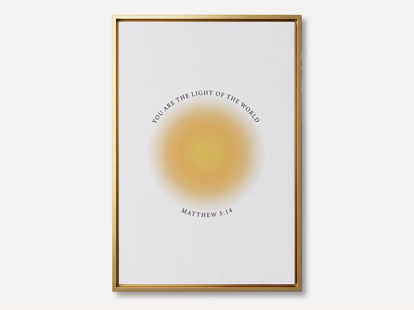 Shine brightly and inspire others with this powerful Christian canvas wall art. This framed canvas print features a modern, ethereal "aura" design and the profound command from Matthew 5:14: "You are the light of the world."