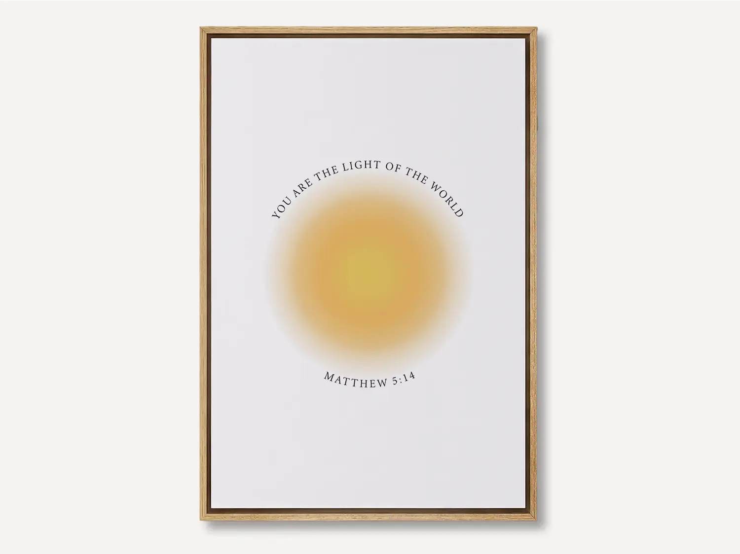 Shine brightly and inspire others with this powerful Christian canvas wall art. This framed canvas print features a modern, ethereal "aura" design and the profound command from Matthew 5:14: "You are the light of the world."