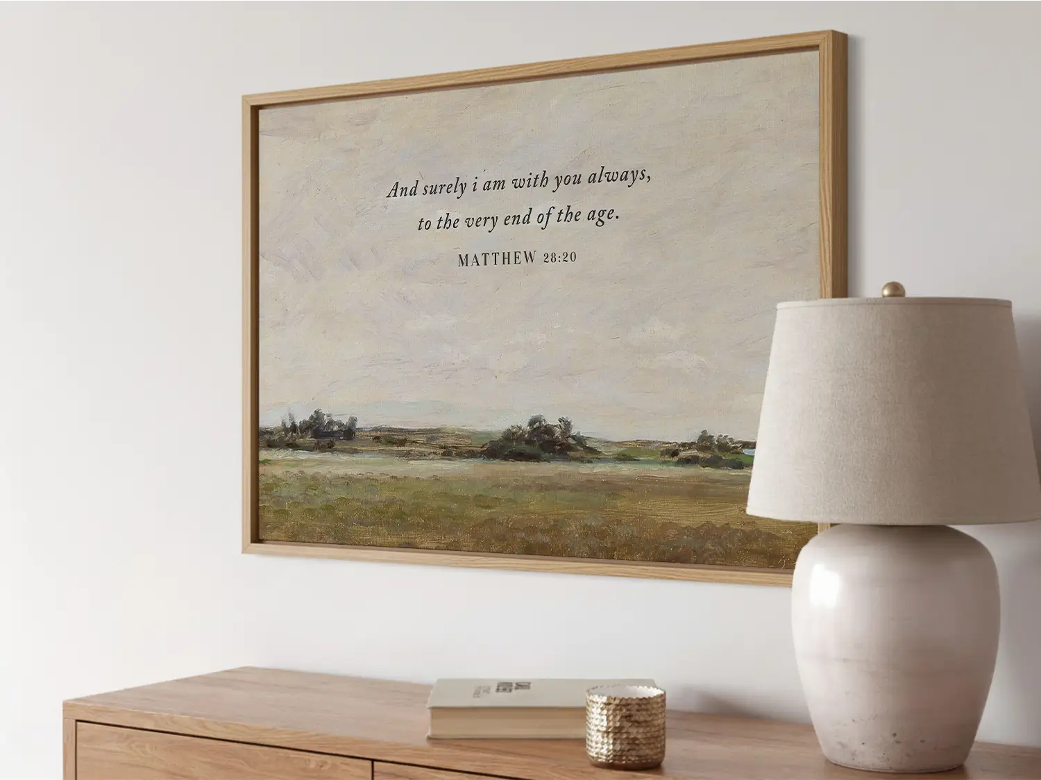 Anchor your faith in the promise of Christ's eternal presence with this inspiring Christian wall art. This framed print features a serene landscape painting paired with the comforting final words of Jesus: "And surely I am with you always, to the very end of the age."