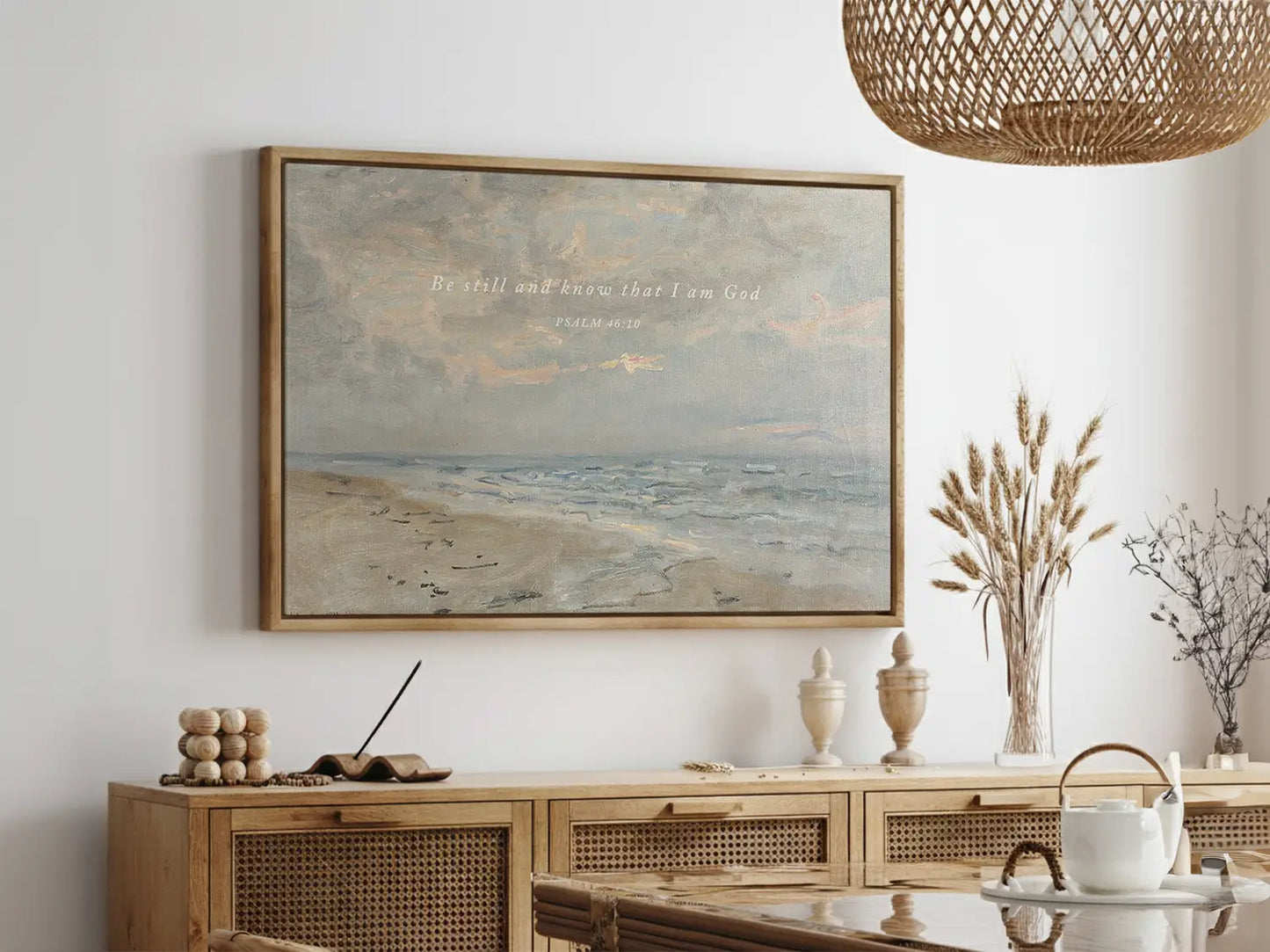 Invite calm and faith into your home with this inspiring Christian wall art. This framed print features a serene coastal landscape paired with the powerful, comforting command from Psalm 46:10 to Be Still and Know That I Am God.