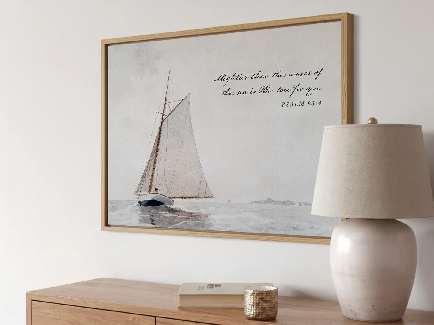 Anchor your heart in unwavering love with this inspiring Christian wall art. This framed print features a serene sailboat painting paired with the powerful promise from Psalm 93:4: "Mightier than the waves of the sea is His love for you."