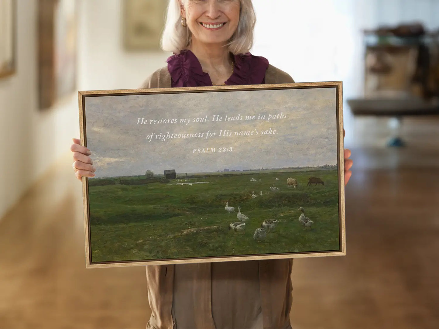 Invite peace and renewal into your space with this inspiring Christian wall art. This framed print features a calming pastoral landscape paired with the comforting promise from Psalm 23:3 about the restoration of the soul.