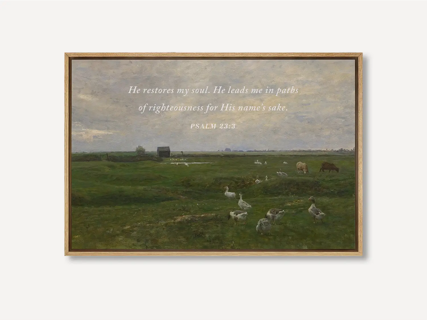 Invite peace and renewal into your space with this inspiring Christian wall art. This framed print features a calming pastoral landscape paired with the comforting promise from Psalm 23:3 about the restoration of the soul.