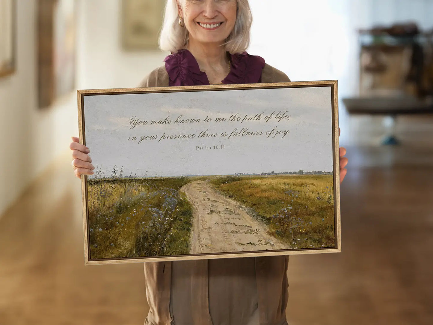 Discover fullness of joy in God's presence with this inspiring Christian wall art. This framed print features a beautiful, rustic landscape painting paired with the comforting promise from Psalm 16:11.