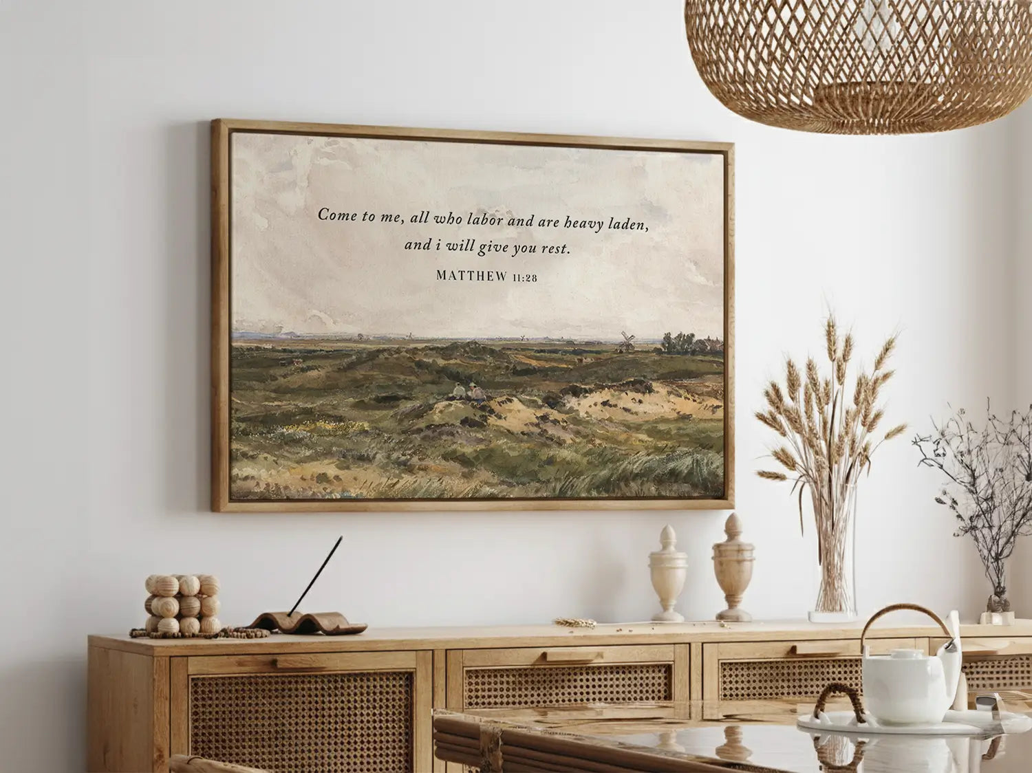 Invite true peace and rest into your home with this inspiring Christian wall art. This framed print features a classic landscape painting paired with the comforting invitation from Matthew 11:28: "Come to me, all who labor and are heavy laden, and I will give you rest."