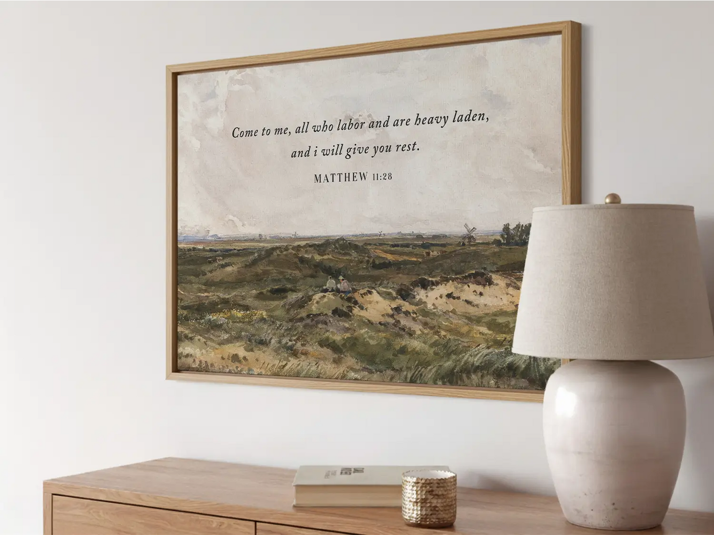 Invite true peace and rest into your home with this inspiring Christian wall art. This framed print features a classic landscape painting paired with the comforting invitation from Matthew 11:28: "Come to me, all who labor and are heavy laden, and I will give you rest."