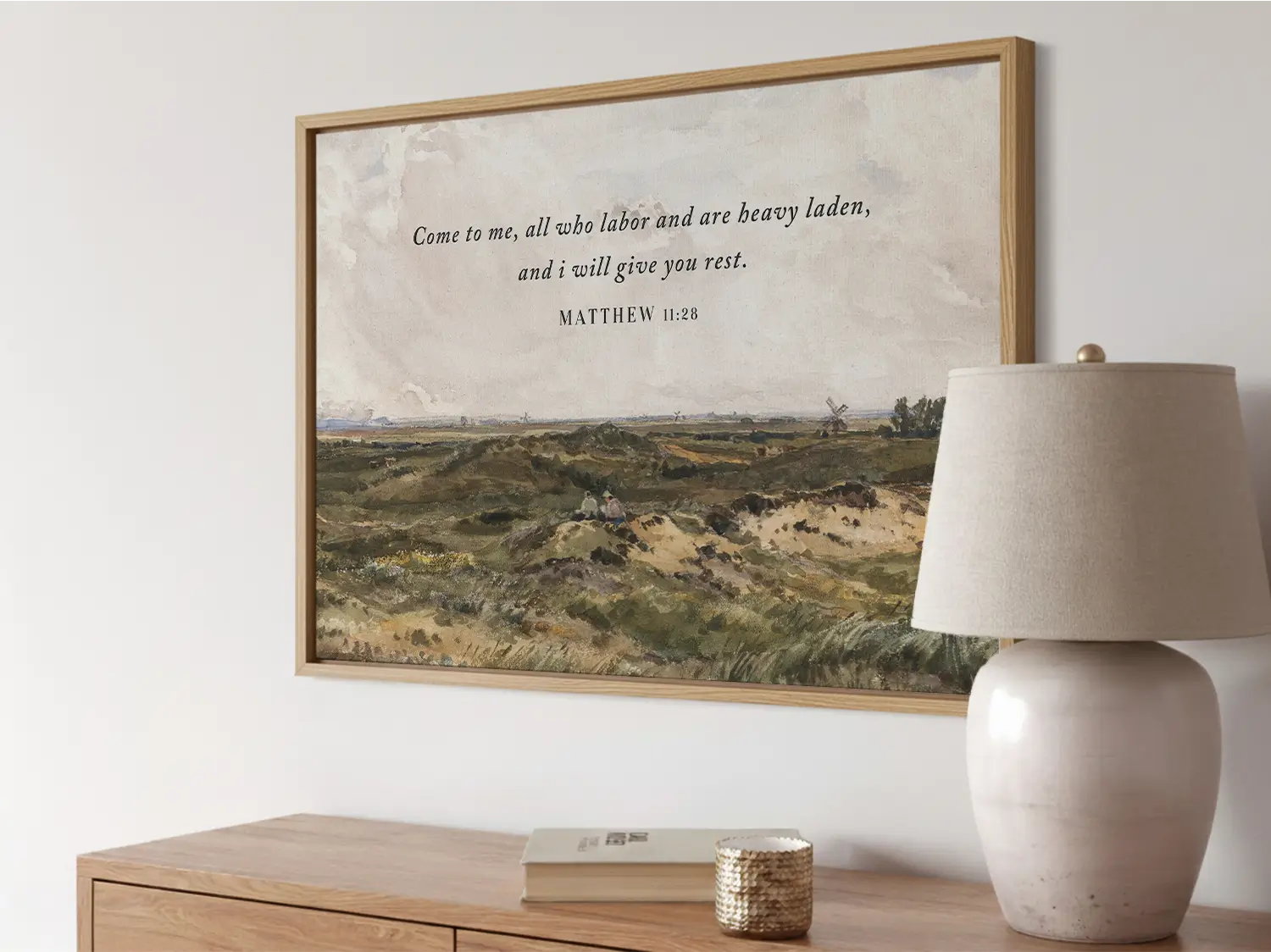 Invite true peace and rest into your home with this inspiring Christian wall art. This framed print features a classic landscape painting paired with the comforting invitation from Matthew 11:28: "Come to me, all who labor and are heavy laden, and I will give you rest."