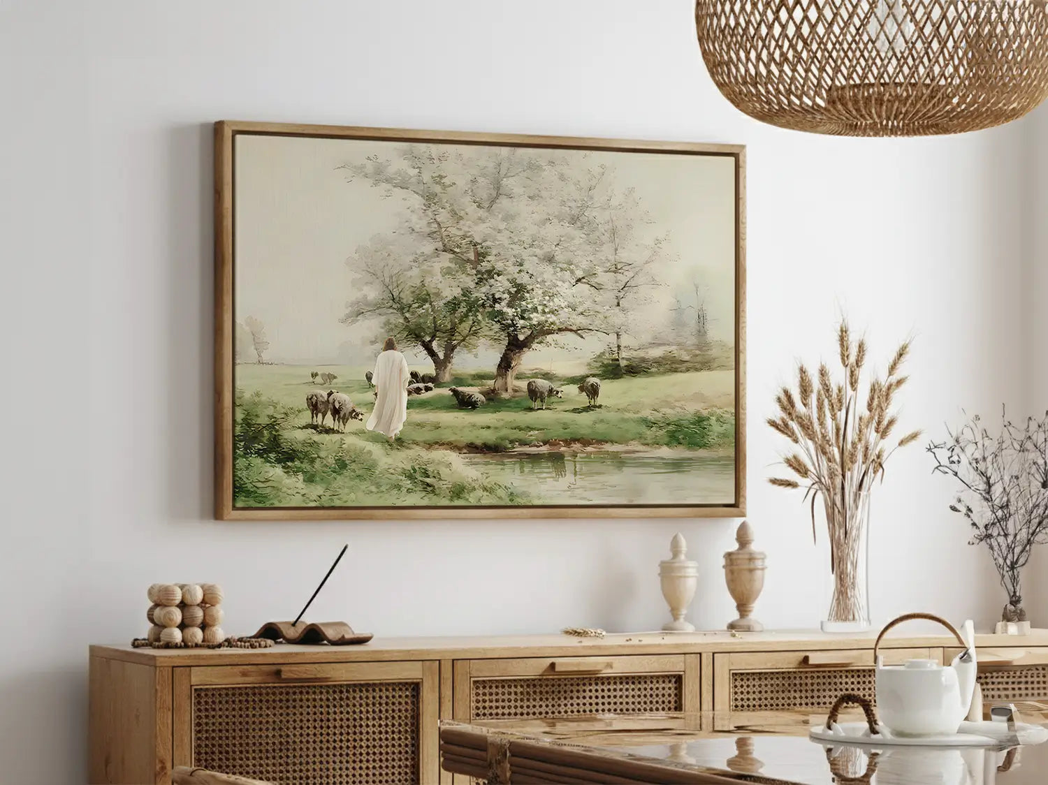 Invite the profound comfort of Christ's presence into your home with this inspiring Christian wall art. This framed print features a beautiful, classic painting of Jesus as the Good Shepherd tending his flock by still waters.