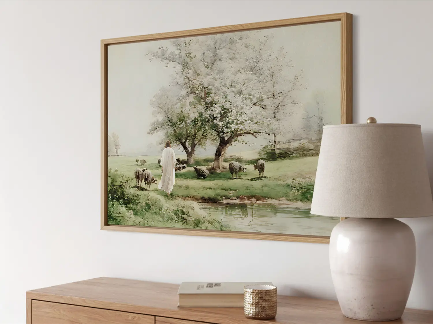 Invite the profound comfort of Christ's presence into your home with this inspiring Christian wall art. This framed print features a beautiful, classic painting of Jesus as the Good Shepherd tending his flock by still waters.