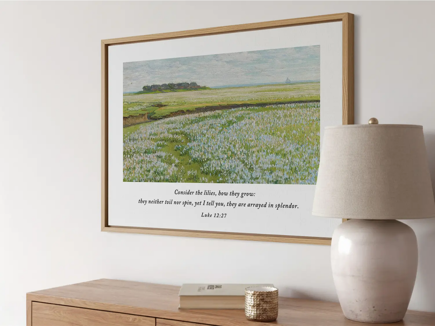 Invite the gentle reminder of God's perfect care into your home with this inspiring Christian wall art. This framed print features a beautiful field painting paired with the comforting teaching from Luke 12:27: "Consider the lilies, how they grow..."