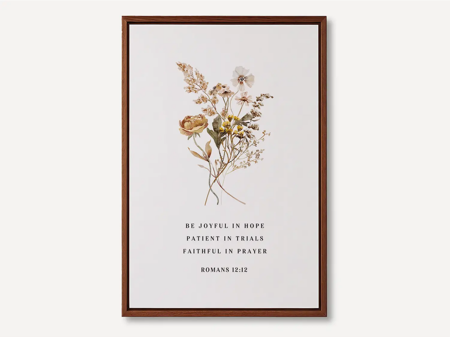 Anchor your heart in hope and resilience with this inspiring Christian canvas wall art. This framed canvas print features a beautiful pressed floral illustration paired with the powerful encouragement from Romans 12:12 to be joyful, patient, and faithful.