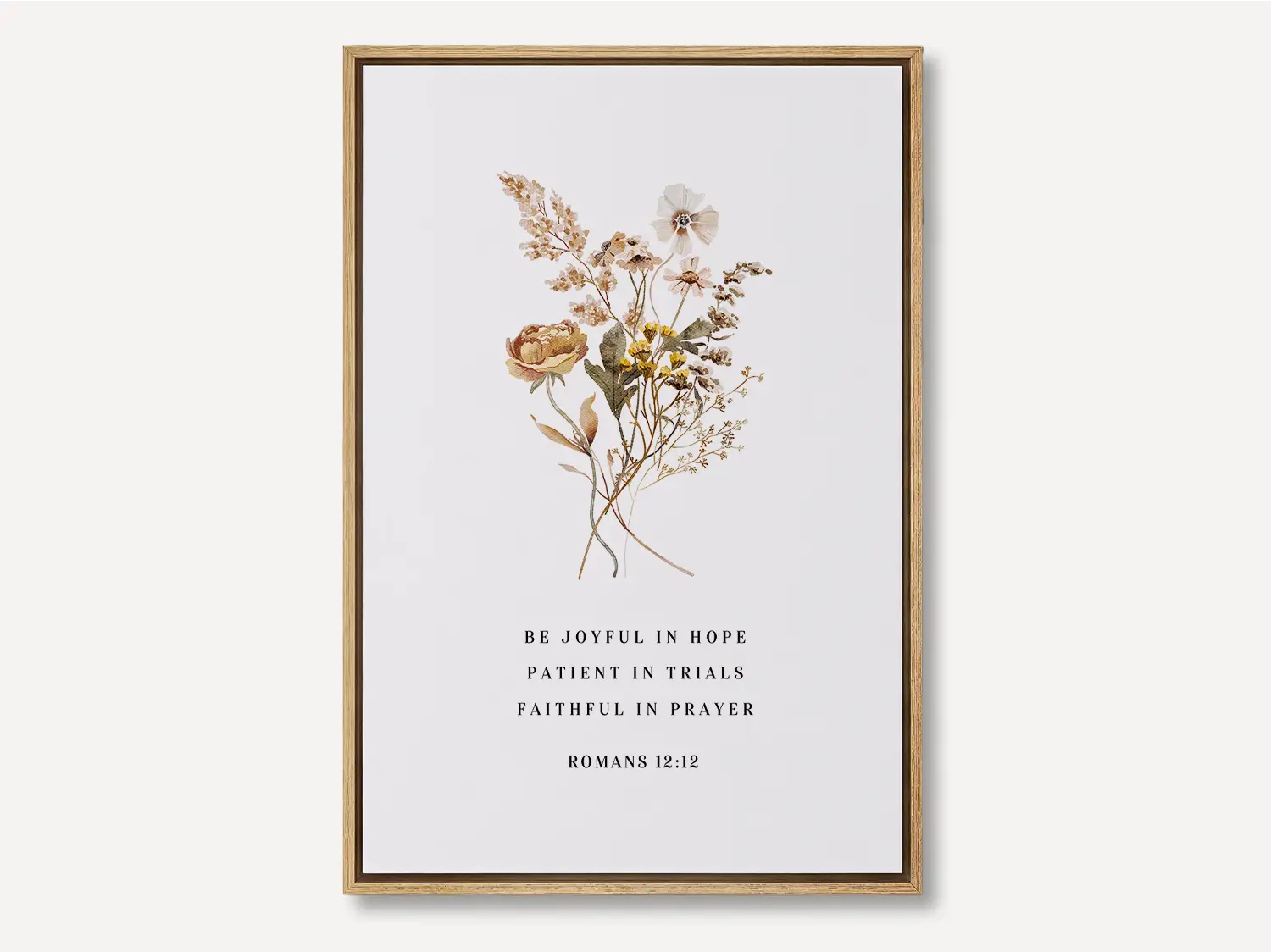 Anchor your heart in hope and resilience with this inspiring Christian canvas wall art. This framed canvas print features a beautiful pressed floral illustration paired with the powerful encouragement from Romans 12:12 to be joyful, patient, and faithful.
