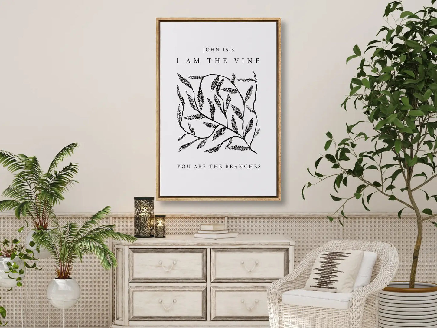 Anchor your home in the source of life and fruitfulness with this inspiring Christian canvas wall art. This framed canvas print features a modern, hand-drawn vine illustration and the essential truth from John 15:5: "I am the vine; you are the branches."