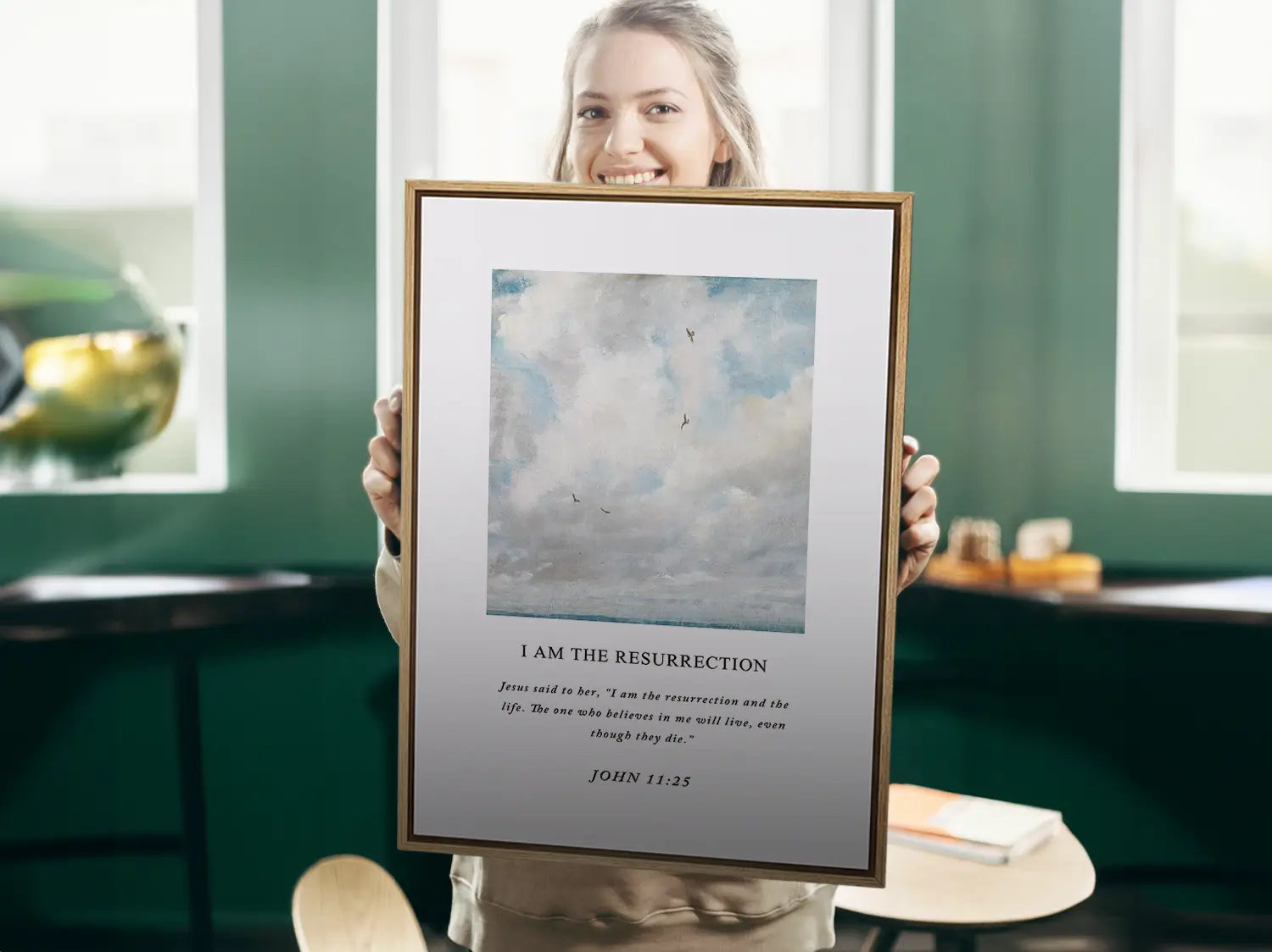 Anchor your hope in eternity with this inspiring Christian canvas wall art. This framed canvas print features a serene sky painting paired with the powerful declaration from John 11:25: "I am the resurrection and the life."