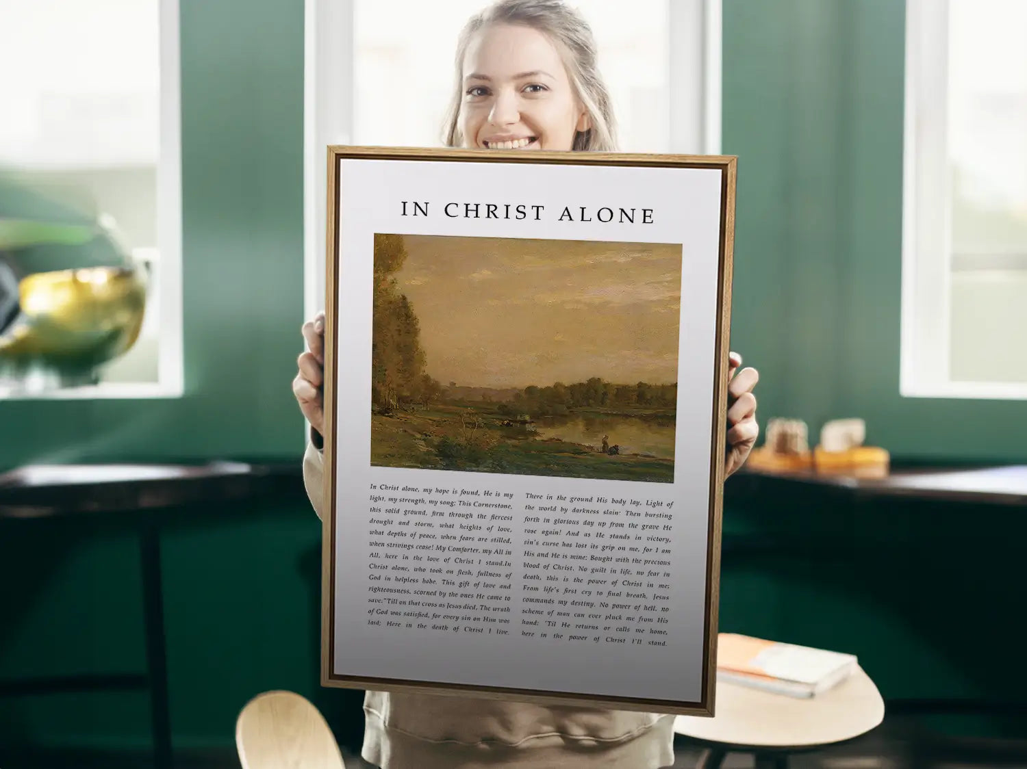 Anchor your life and hope in the solid ground of Christ with this inspiring Christian canvas wall art. This framed canvas print features the powerful, modern lyrics of "In Christ Alone," paired with a calming landscape painting.