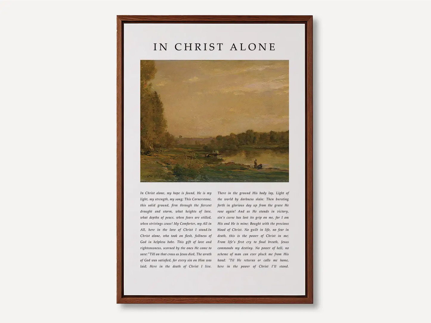 Anchor your life and hope in the solid ground of Christ with this inspiring Christian canvas wall art. This framed canvas print features the powerful, modern lyrics of "In Christ Alone," paired with a calming landscape painting.