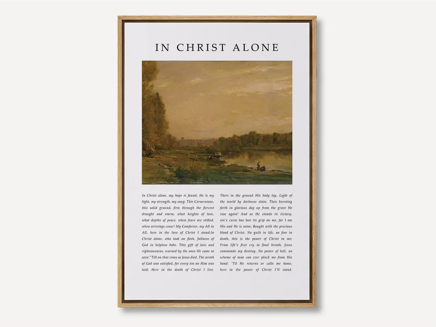 Anchor your life and hope in the solid ground of Christ with this inspiring Christian canvas wall art. This framed canvas print features the powerful, modern lyrics of "In Christ Alone," paired with a calming landscape painting.