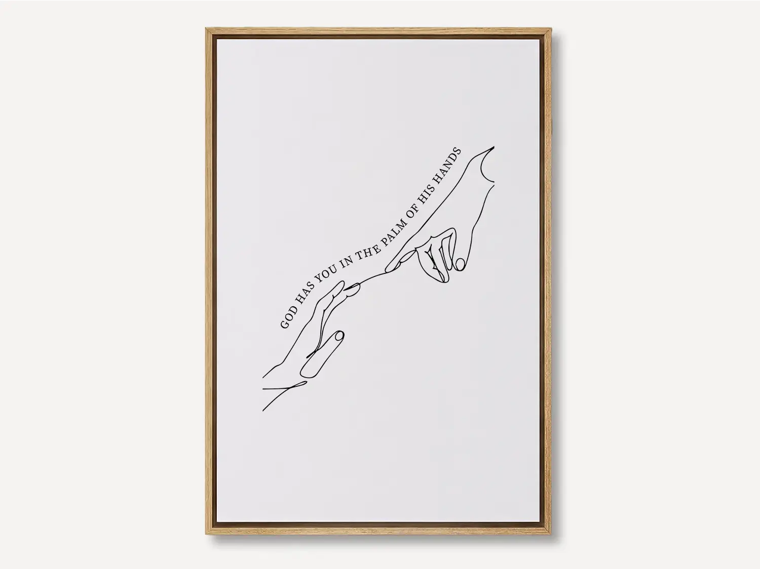 Find comfort and security in God's grasp with this inspiring Christian canvas wall art. This framed canvas print features a beautiful, modern line-art illustration of two hands meeting, highlighting the powerful promise from Isaiah 49:16: “God has you in the palm of His hands.”