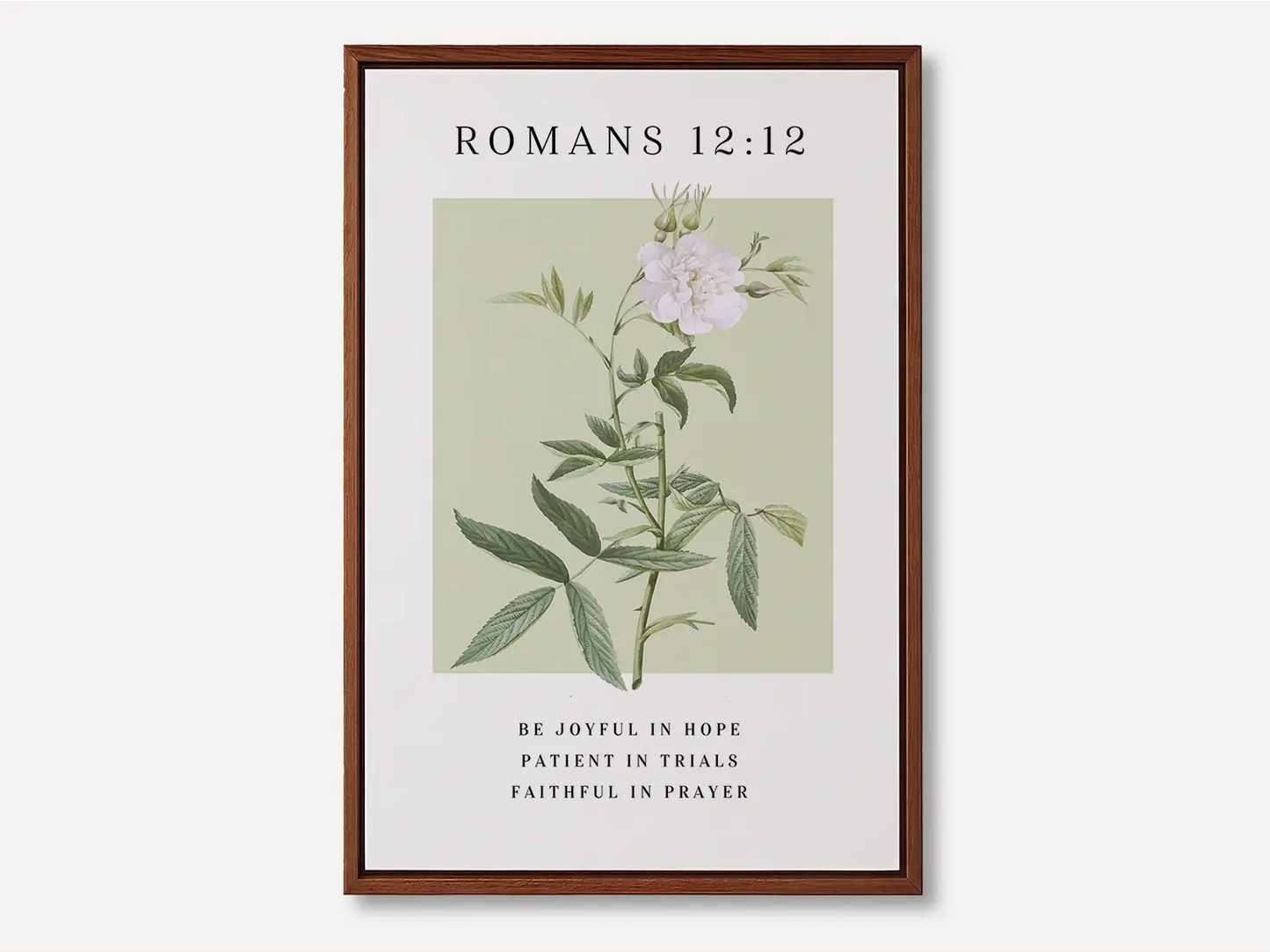 Anchor your heart in hope and resilience with this inspiring Christian canvas wall art. This framed canvas print features a calming botanical illustration paired with the powerful encouragement from Romans 12:12 to be joyful, patient, and faithful.