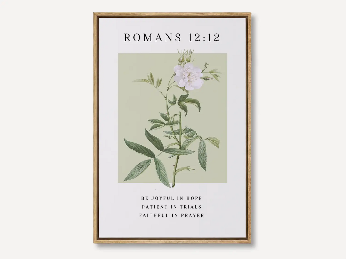 Anchor your heart in hope and resilience with this inspiring Christian canvas wall art. This framed canvas print features a calming botanical illustration paired with the powerful encouragement from Romans 12:12 to be joyful, patient, and faithful.