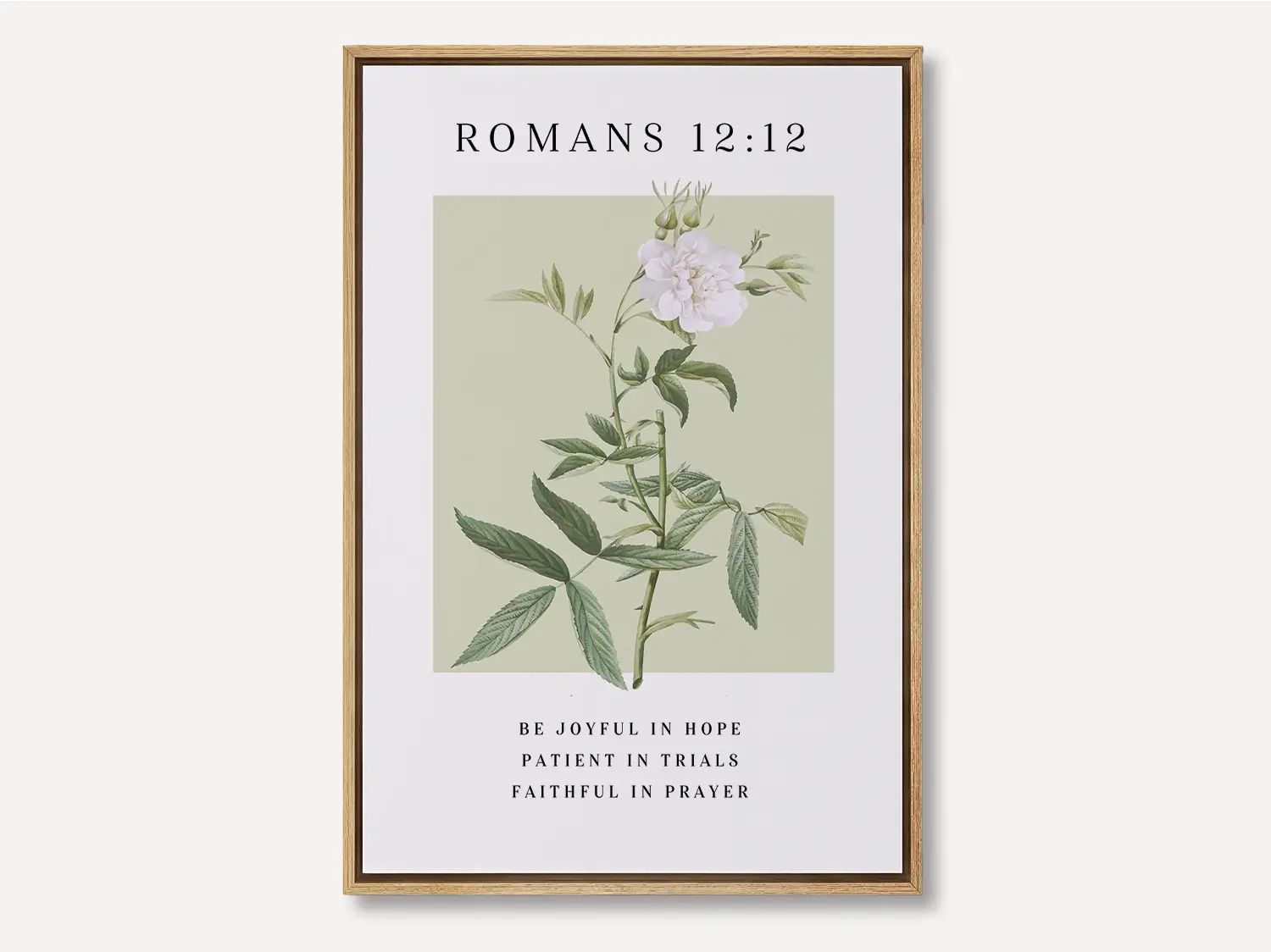 Anchor your heart in hope and resilience with this inspiring Christian canvas wall art. This framed canvas print features a calming botanical illustration paired with the powerful encouragement from Romans 12:12 to be joyful, patient, and faithful.