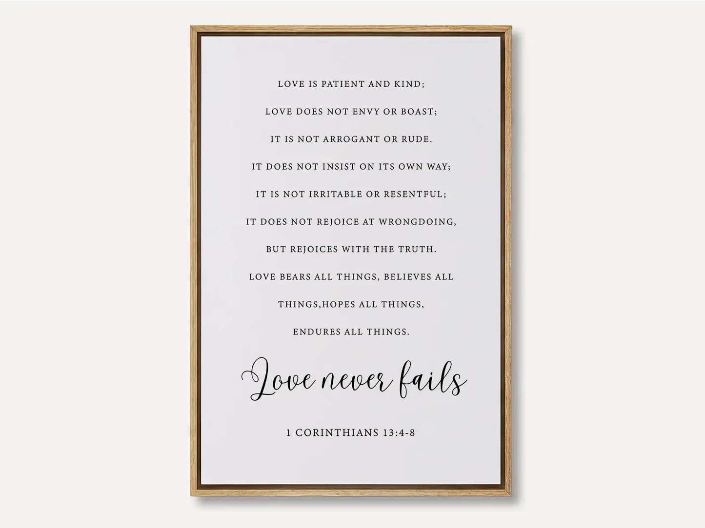 Anchor your home in Christ's unwavering love with this inspiring Christian canvas wall art. This framed canvas print features the complete, profound text of 1 Corinthians 13:4-8, highlighting the powerful truth that Love never fails.