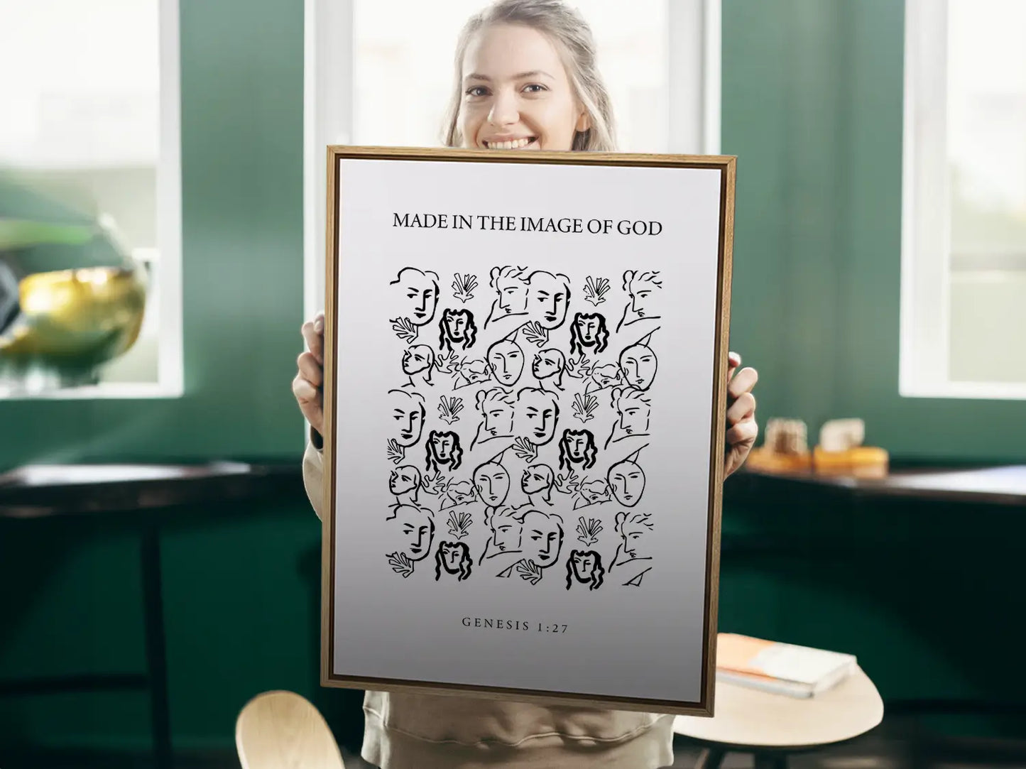 Celebrate the profound value of every person with this inspiring Christian canvas wall art. This framed canvas print features a modern, abstract portrait illustration and the foundational truth from Genesis 1:27: "Made in the Image of God."
