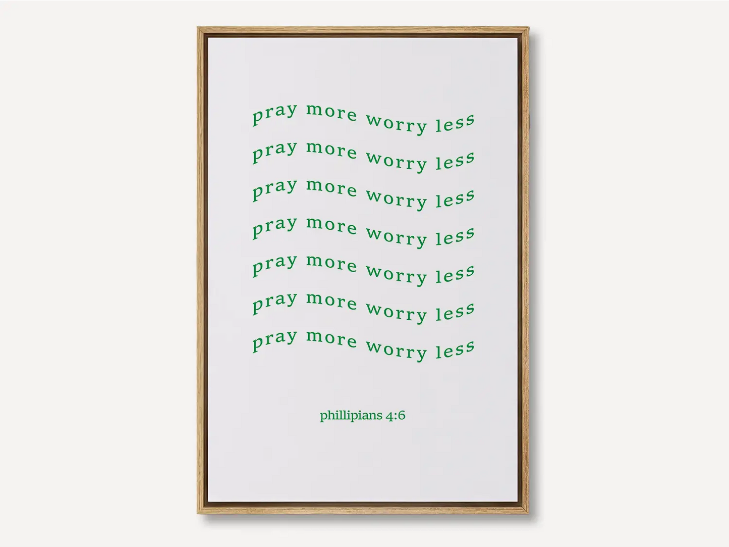 Find daily peace and encouragement with this inspiring Christian canvas wall art. This framed canvas print features a fun, repeating typographic design and the powerful instruction from Philippians 4:6 to Pray more worry less.