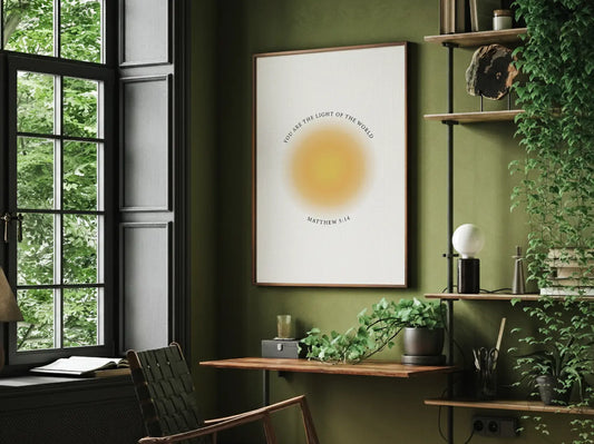 Shine brightly and inspire others with this powerful Christian canvas wall art. This framed canvas print features a modern, ethereal "aura" design and the profound command from Matthew 5:14: "You are the light of the world."