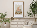 Minimalist Christian scripture wall art Bear Much Fruit hanging in a dining room