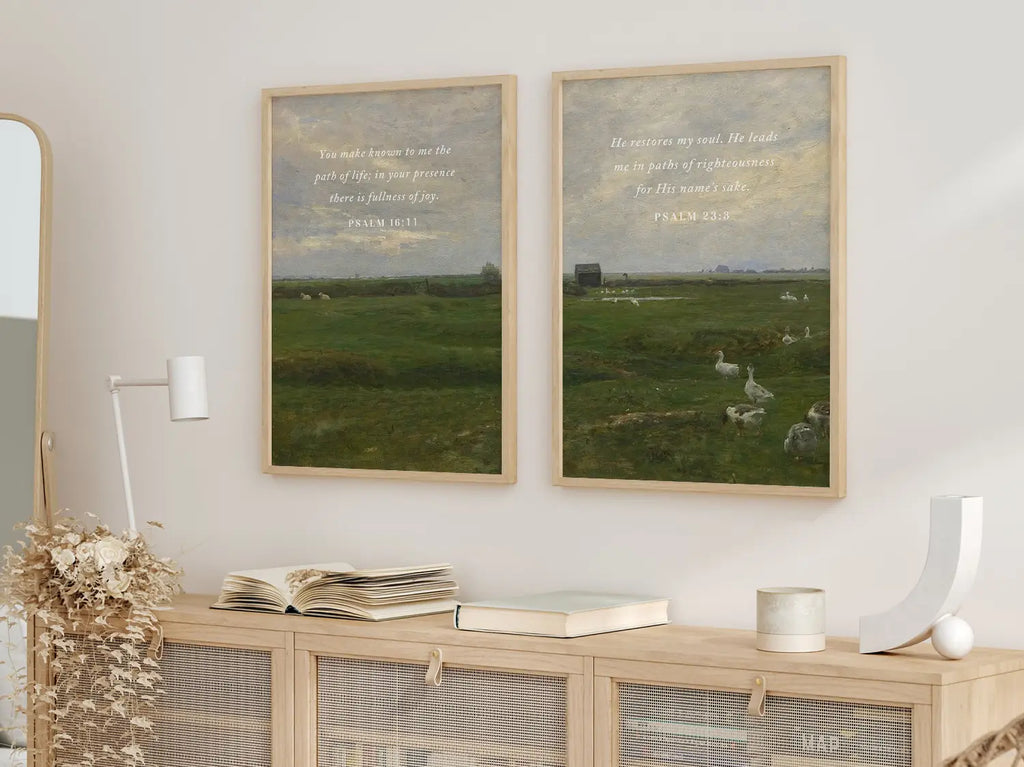 Anchor your home in serenity with this inspiring Christian wall art set. This collection of two framed scripture prints features calming pastoral landscapes paired with powerful promises of fullness of joy and restoration of the soul.