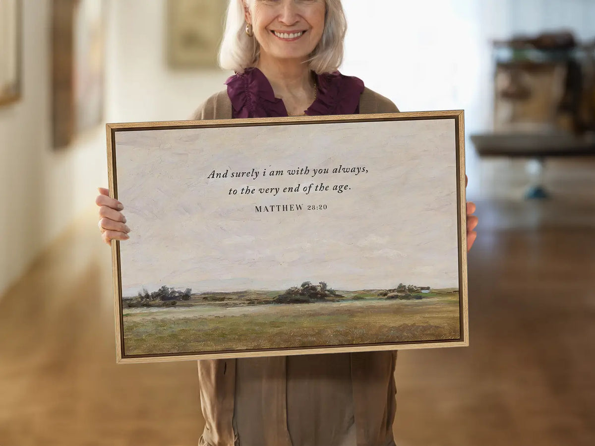 Anchor your faith in the promise of Christ's eternal presence with this inspiring Christian wall art. This framed print features a serene landscape painting paired with the comforting final words of Jesus: "And surely I am with you always, to the very end of the age."