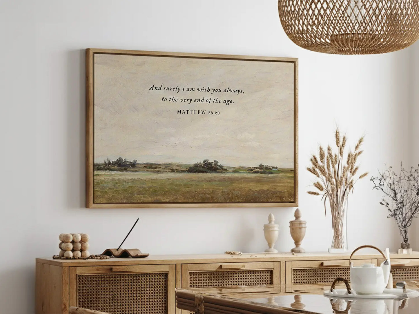 Anchor your faith in the promise of Christ's eternal presence with this inspiring Christian wall art. This framed print features a serene landscape painting paired with the comforting final words of Jesus: "And surely I am with you always, to the very end of the age."
