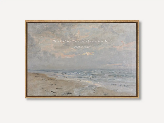 Invite calm and faith into your home with this inspiring Christian wall art. This framed print features a serene coastal landscape paired with the powerful, comforting command from Psalm 46:10 to Be Still and Know That I Am God.