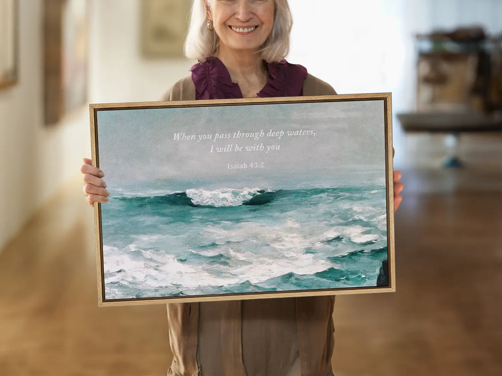 Anchor your heart in hope with this powerful Christian wall art. This framed print features a dynamic seascape painting paired with the comforting promise from Isaiah 43:2: "When you pass through deep waters, I will be with you."