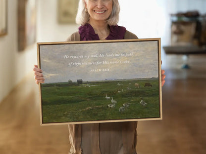 Invite peace and renewal into your space with this inspiring Christian wall art. This framed print features a calming pastoral landscape paired with the comforting promise from Psalm 23:3 about the restoration of the soul.