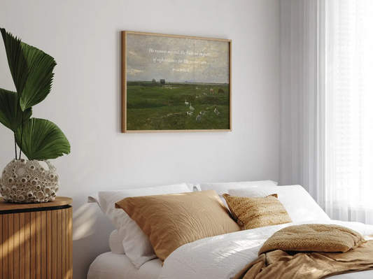 Invite peace and renewal into your space with this inspiring Christian wall art. This framed print features a calming pastoral landscape paired with the comforting promise from Psalm 23:3 about the restoration of the soul.