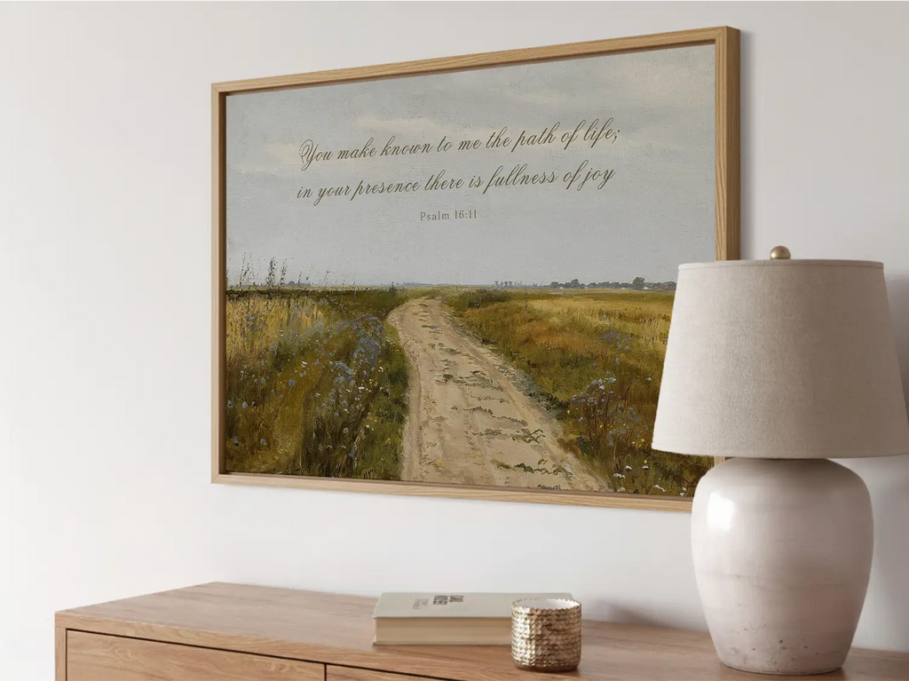 Discover fullness of joy in God's presence with this inspiring Christian wall art. This framed print features a beautiful, rustic landscape painting paired with the comforting promise from Psalm 16:11.