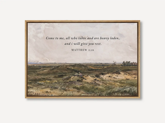 Invite true peace and rest into your home with this inspiring Christian wall art. This framed print features a classic landscape painting paired with the comforting invitation from Matthew 11:28: "Come to me, all who labor and are heavy laden, and I will give you rest."