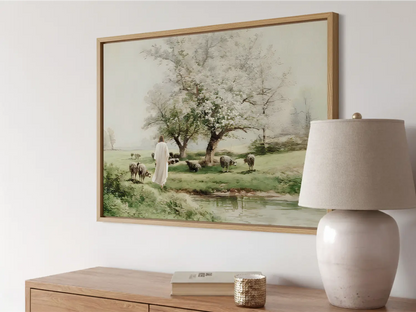 Invite the profound comfort of Christ's presence into your home with this inspiring Christian wall art. This framed print features a beautiful, classic painting of Jesus as the Good Shepherd tending his flock by still waters.