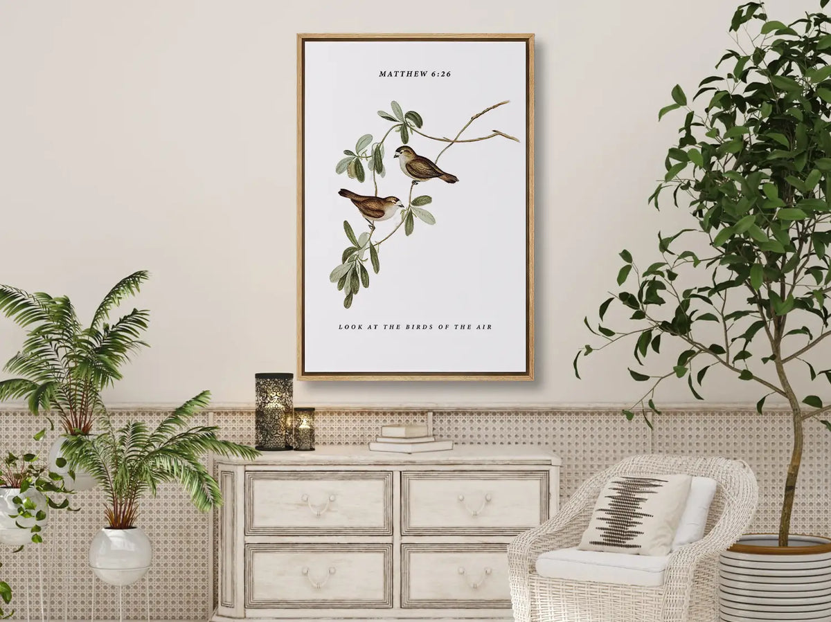 Invite the gentle wisdom of God's perfect care into your home with this inspiring Christian canvas wall art. This framed canvas print features a beautiful botanical illustration of birds, paired with the comforting teaching from Matthew 6:26 to trust in Divine provision.