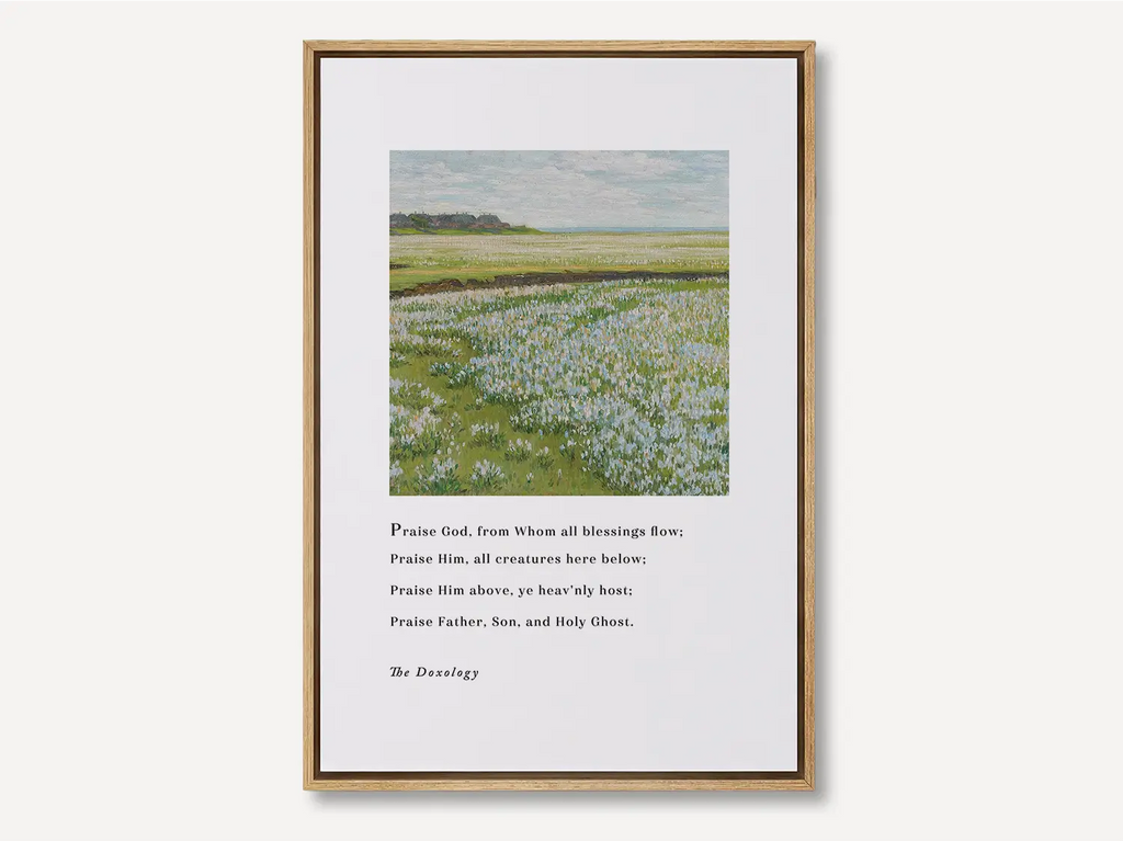 Framed Christian canvas wall art featuring The Doxology hymn “Praise God from whom all blessings flow” over a peaceful wildflower landscape