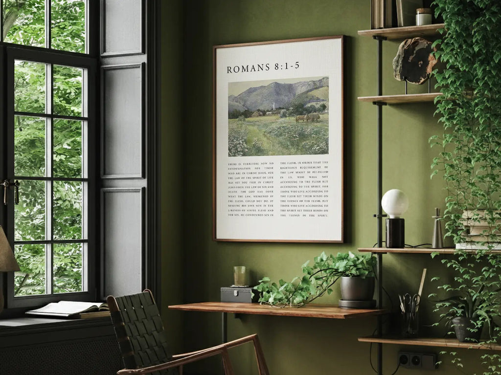 Framed Christian landscape canvas wall art displaying Romans 8 scripture in a living room setting.