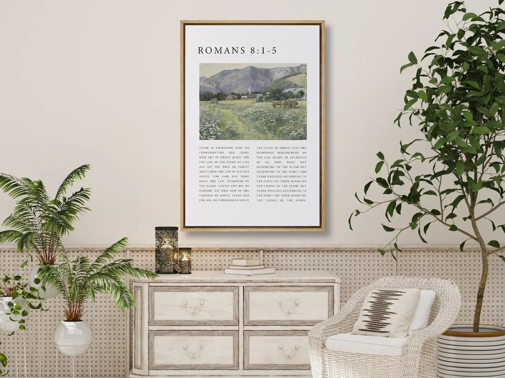 Anchor your home in the freedom and power of the Holy Spirit with this inspiring Christian canvas wall art. This framed canvas print features a peaceful village landscape paired with the foundational truth from Romans 8:1-5 on living by the Spirit.