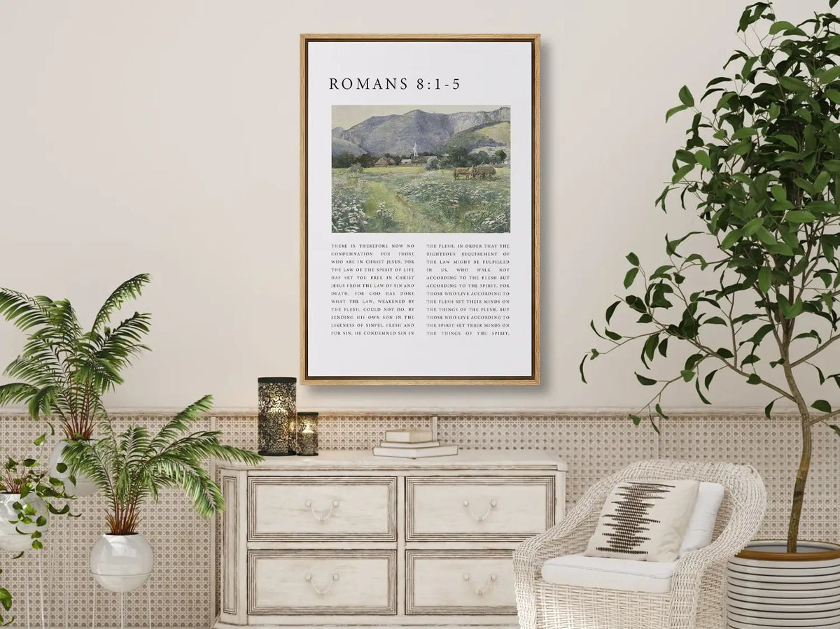 Anchor your home in the freedom and power of the Holy Spirit with this inspiring Christian canvas wall art. This framed canvas print features a peaceful village landscape paired with the foundational truth from Romans 8:1-5 on living by the Spirit.