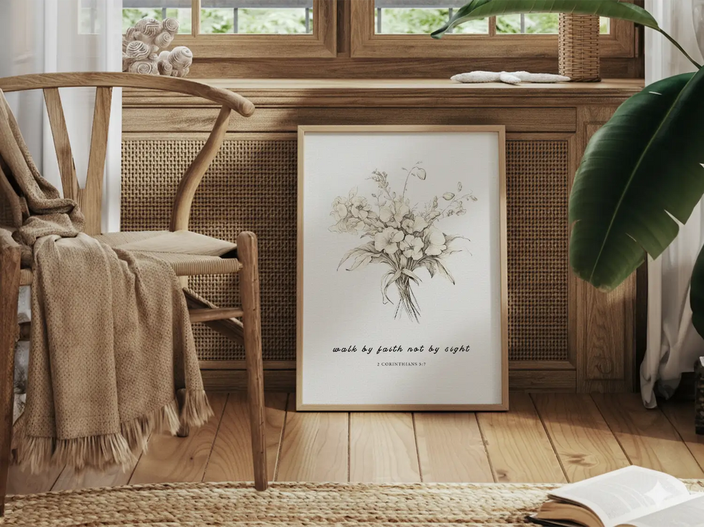 Anchor your life in trust with this inspiring Christian canvas wall art. This framed canvas print features an elegant floral sketch paired with the guiding scripture from 2 Corinthians 5:7: "Walk by faith not by sight."