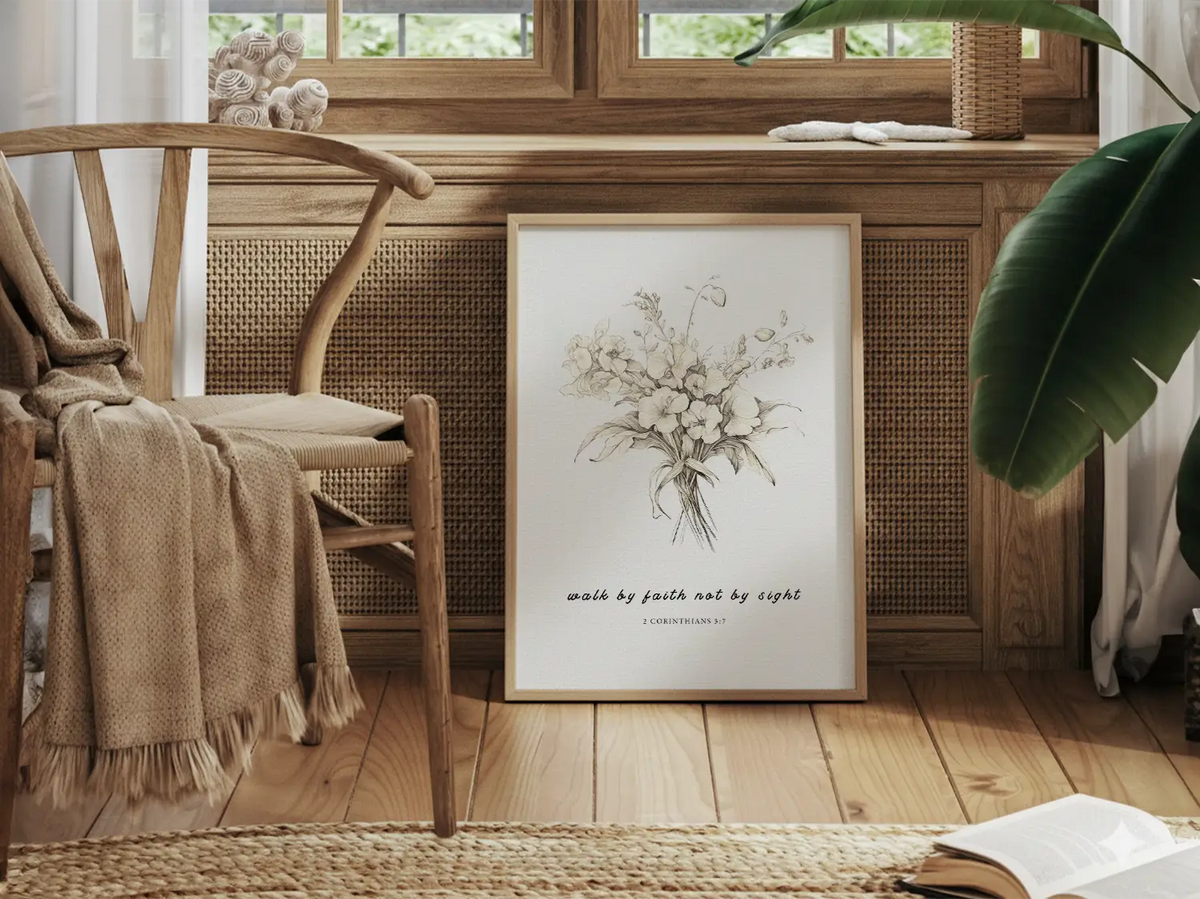 Anchor your life in trust with this inspiring Christian canvas wall art. This framed canvas print features an elegant floral sketch paired with the guiding scripture from 2 Corinthians 5:7: "Walk by faith not by sight."