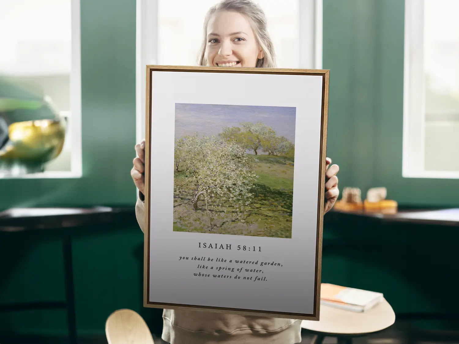 Invite the promise of unending provision into your home with this inspiring Christian canvas wall art. This framed canvas print features a beautiful orchard painting paired with the comforting promise from Isaiah 58:11 that you shall be like a "watered garden."