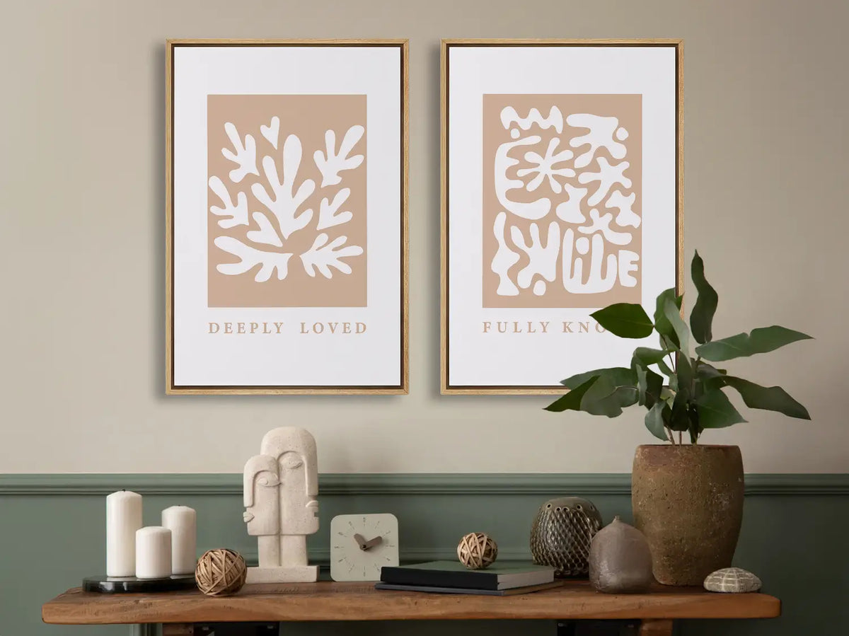 Decorate with faith and style using this inspiring, modern Christian wall art set. This collection of two framed abstract prints features a contemporary design and the comforting truth that you are Deeply Loved & Fully Known by God.